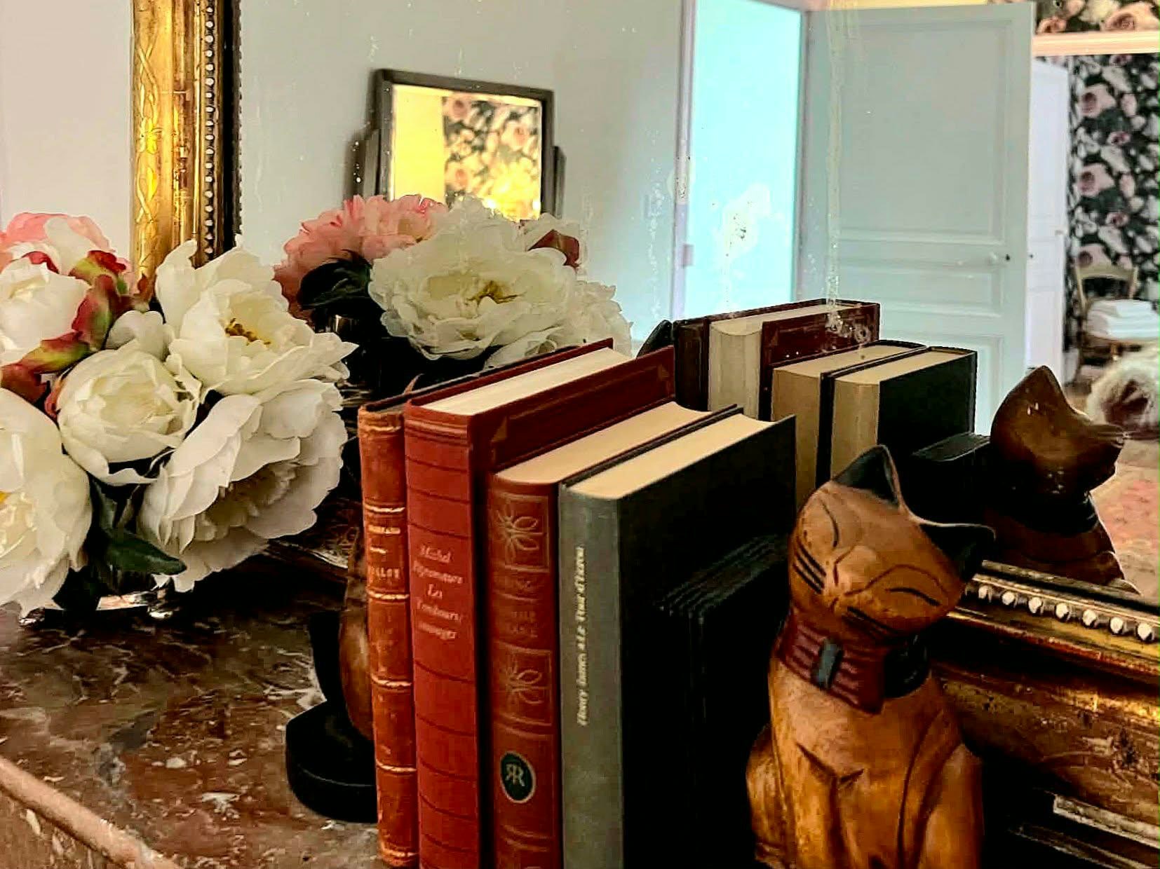 La Chambre Valadon — antique books, flowers and room details